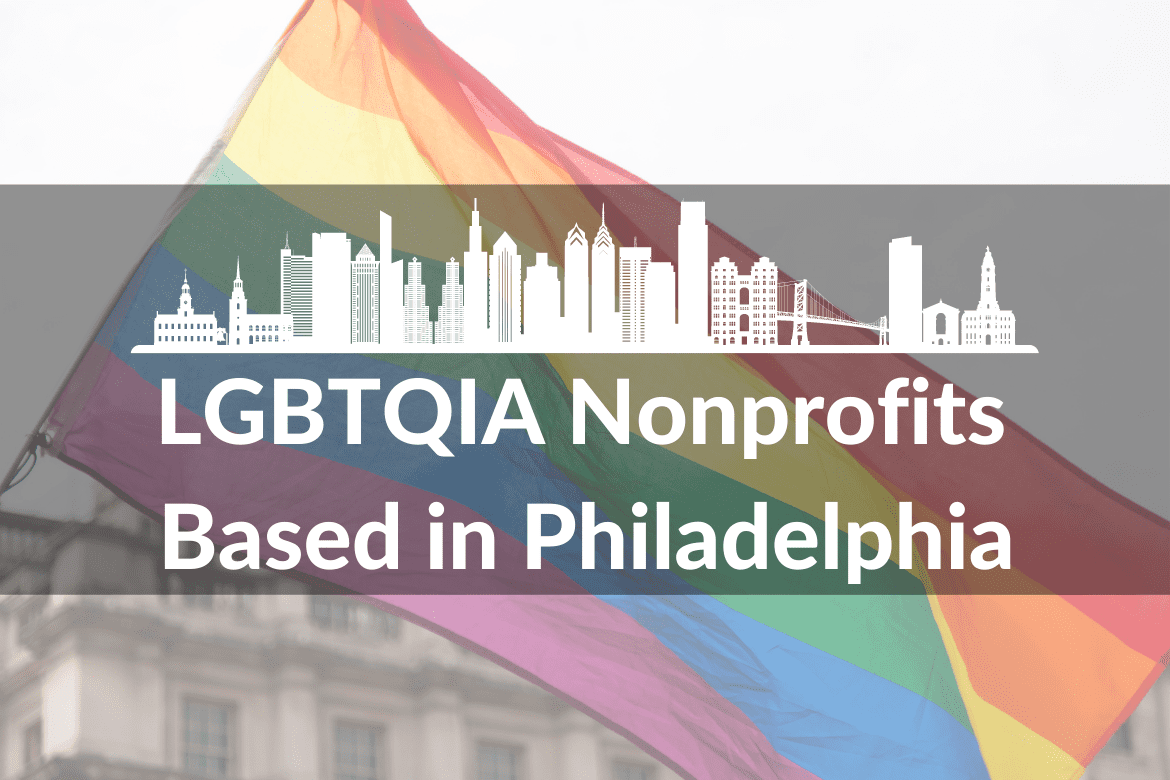 An image of a rainbow flag waving in the background. In the foreground, there is a white graphic of a Philadelphia cityscape. Below the graphic are the words LGBTQIA Nonprofits Based in Philadelphia