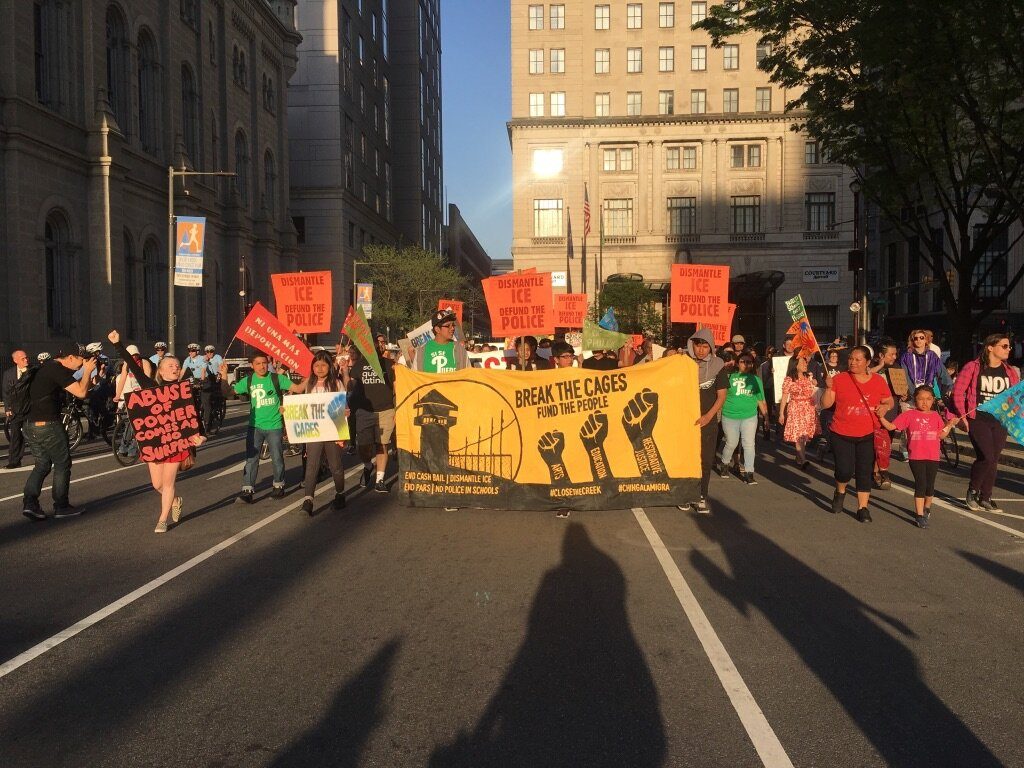 Juntos members in the streets of Philadelphia protesting ICE. 